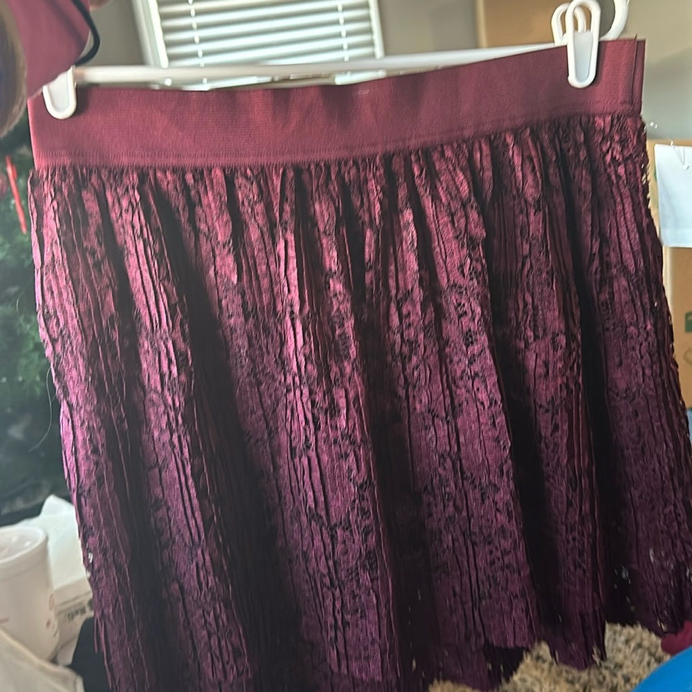 Brand new, with tags, dark maroon Lacey skirt from eci.